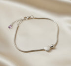 Silver heart and sphere bracelet