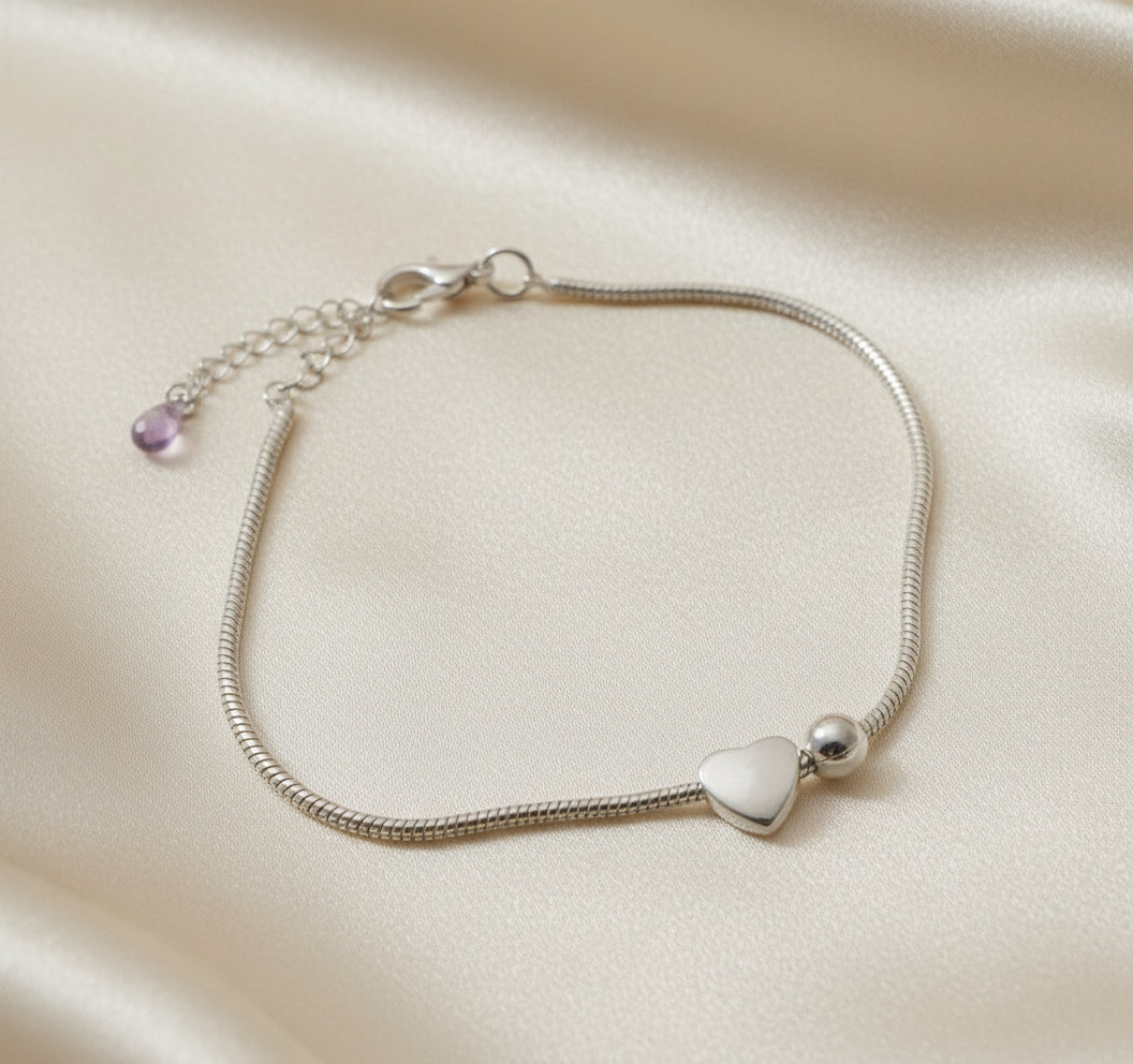 Silver heart and sphere bracelet