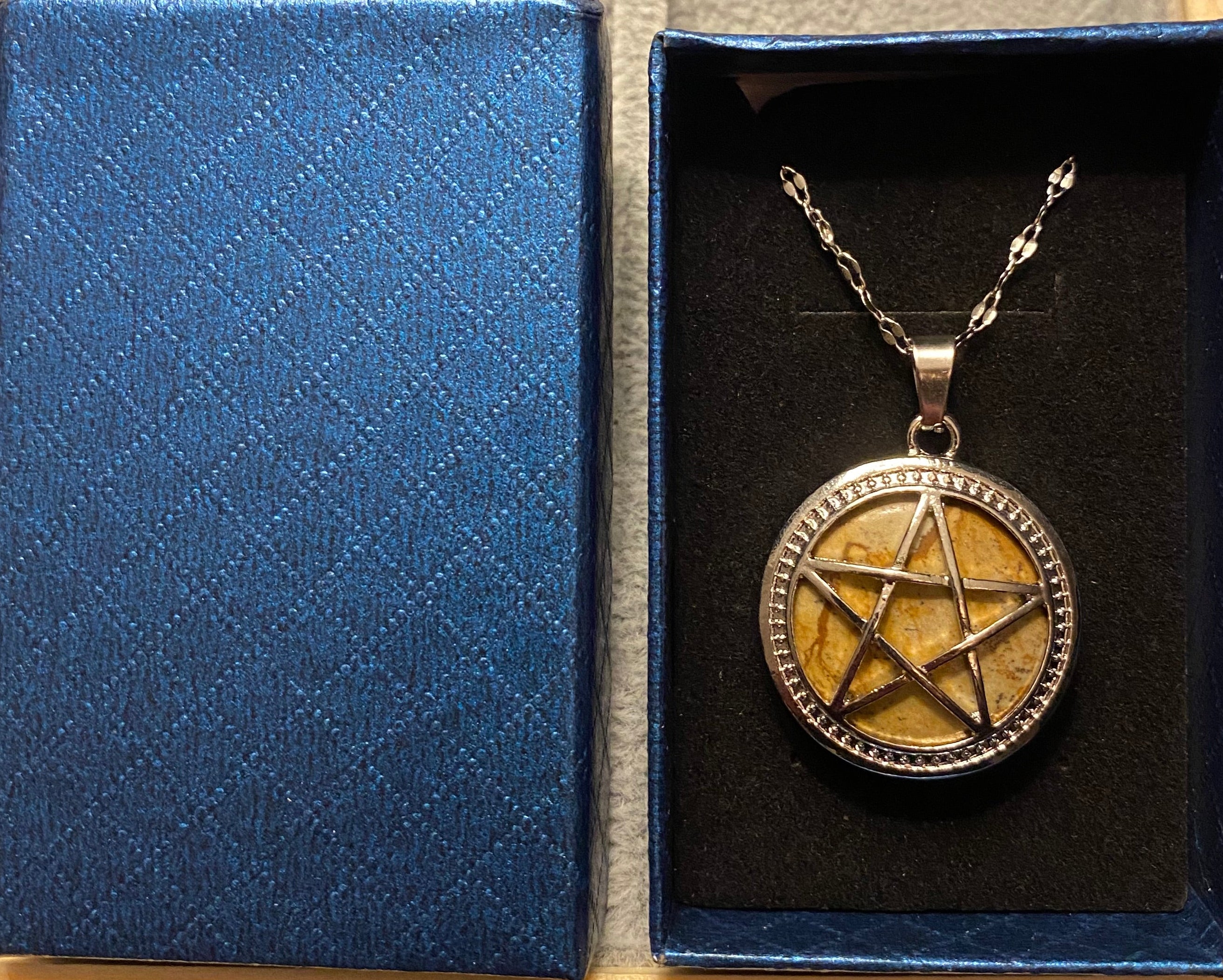 Star silver and stone pendant