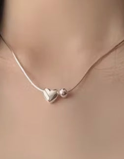 Sterling silver heart and sphere necklace
