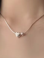 Sterling silver heart and sphere necklace
